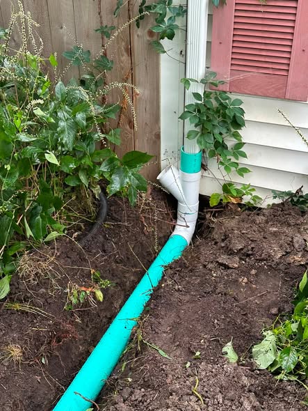 New plastic sump pump discharge line installed by A1 Sewer Service